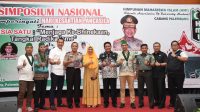 Wa Ode Nurhayati (tengah berhijab) saat menjadi pembicara Simporsium Nasional di Palembang baru baru ini. (Foto : Akun Pribadi WON)
