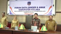 Kepala Dinas PPPA Hj. Mineng (Kedua dari Kiri)