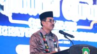 Pj. Bupati Bombana, Drs. Edy Suharmanto, M.Si saat menyampaikan sambutannya