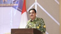 Pj. Bupati Bombana, Edy Suharmanto saat menyampaikan sambutannya