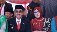 Penjabat (PJ) Bupati Bombana, Drs. Edy Suharmanto, M.Si, dan Pj. Ketua TP PKK Kabupaten Bombana, Aeni Mutmainnah, S.Pd., MM