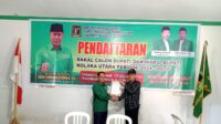 Liaison Officer (LO) H. Jumarding, Asran Durahi saat mendaftar di PPP Kolut
