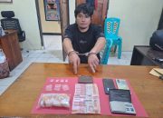 Tersangka bersama barang bukti yang ditemukan