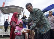 Bupati Yusmin saat meluncurkan Program Makan Siang Gratis
