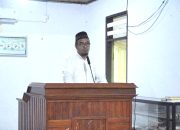 Asisten I Setda Kolaka Utara, Mukhlis Bachtiar, mewakili Pj. Bupati Kolaka Utara H. Yusmin, S.Pd., M.H saat menyampaikan sambutan
