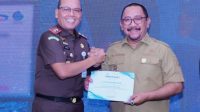 Bupati Bombana menghadiri FGD Kejati Sultra yang membahas penegakan hukum SDA, pemulihan aset, kerugian negara dan perbaikan lingkungan.